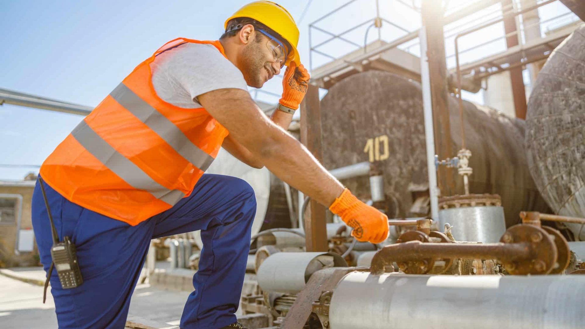 Experienced engineer working hard at industrial plant